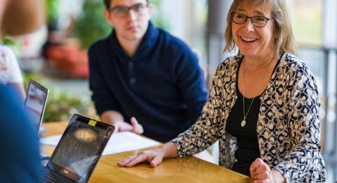 Karen Conway collaborates with students at Paul College.