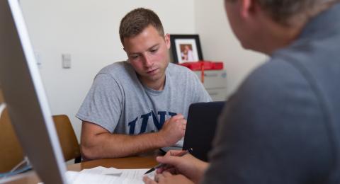 student and professor discussion
