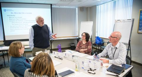 Leadership participants having discussion