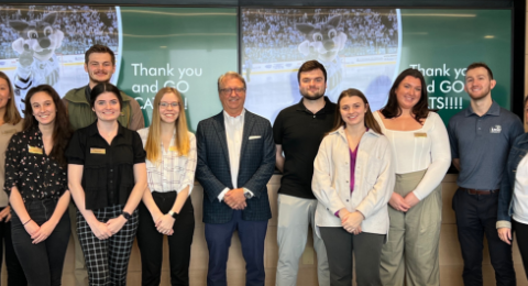 Dean's Ambassadors pose at the CBRE Atlanta office 