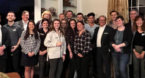 Dean's Ambassadors pose at reception event