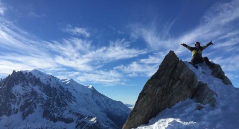 Student on mountain top