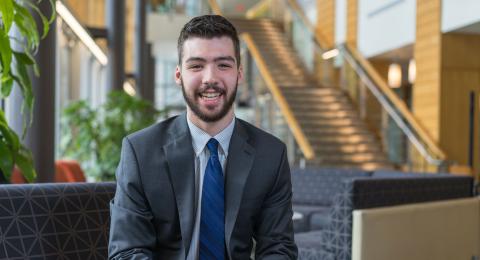 Lawson Martinez '18 sitting in Great Hall 