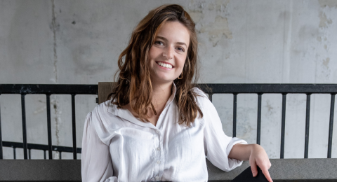Alyssa Floyd smiles at the camera