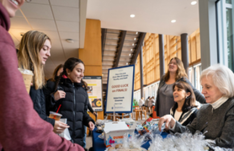 Paul College Dean Deborah Merrill-Sands and Paul College staff give treats to students as part of Free Fuel for Finals