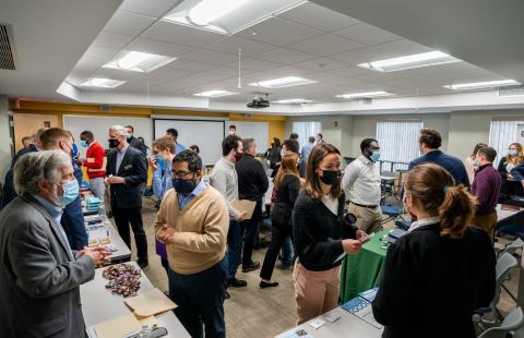 students talk with companies at the first ever capstone fair