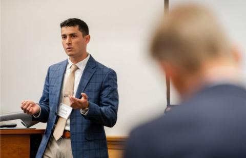 A student gives a presentation at the UNH Finance Symposium  