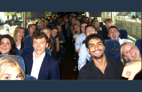 UNH Sales Club team members on a bus to Boston.