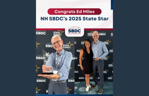 Ed Miles holds his NHSBDC State Star Award