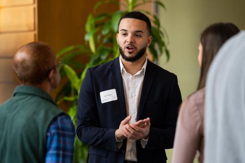 male Paul College student presenting at the Undergraduate Resource Conference male Paul College student presenting at the Undergraduate Resource Conference