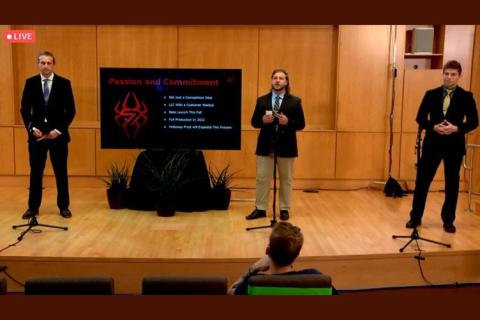 ATHANIEL HUNT '21 (CENTER) PRESENTING IN THE FINAL CHAMPIONSHIP ROUND OF THE HOLLOWAY PRIZE COMPETITION, WITH JOEY NELEBER ’22 (LEFT) AND BRAYDEN ESMAILI ’23 (RIGHT)
